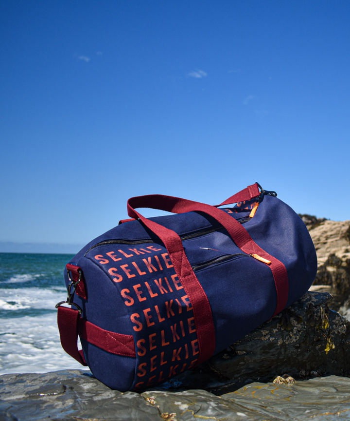 SELKIE CANVAS BARREL BAG - NAVY with Logo