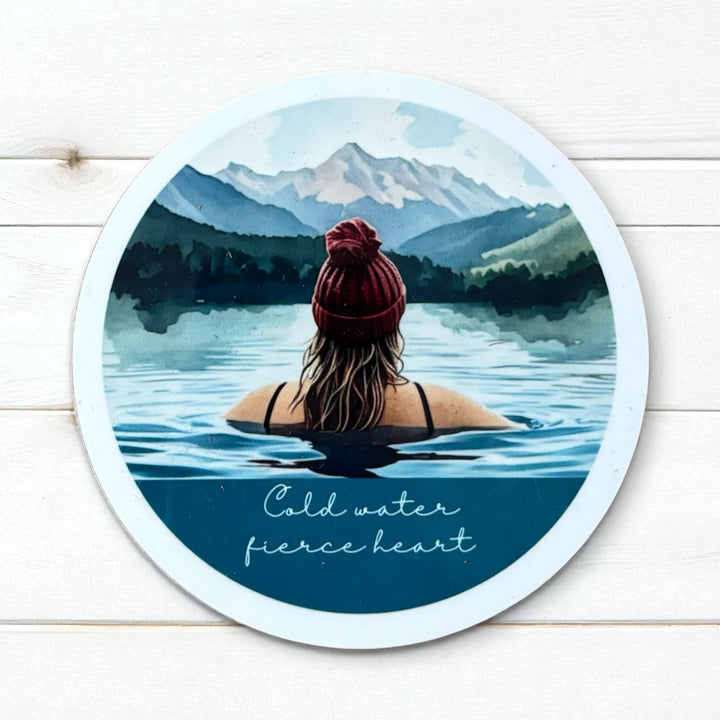 Cold Water, Fierce Heart Round Coaster – Wild Swimmer in Lake with Bobble Hat (Blonde or Brunette) | Outdoor Swim Décor