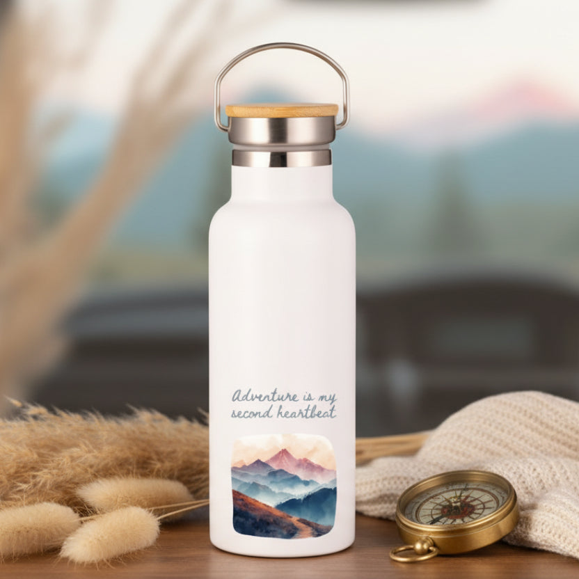 White water bottle with mountain design and &