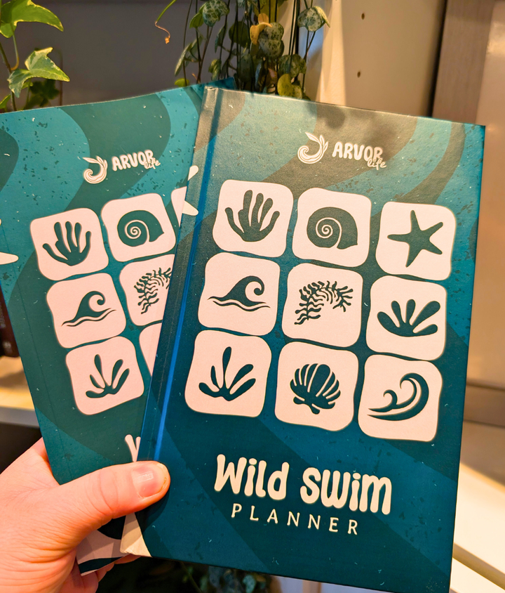 Green Wild Swim Planner for outdoor swimmers with lush nature design by Arvor Life.