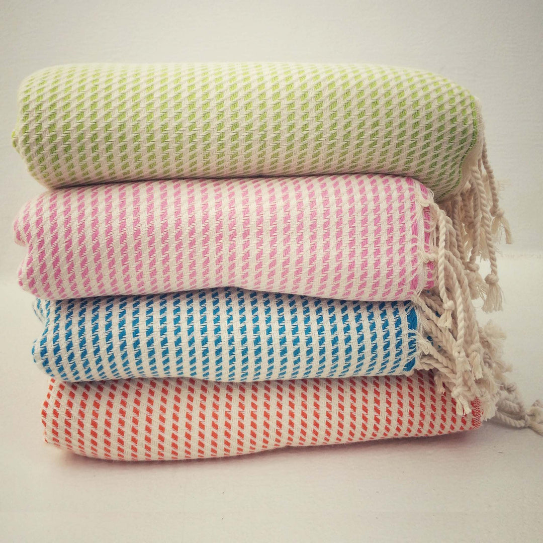 Stack of 4 hammam towels in different colours