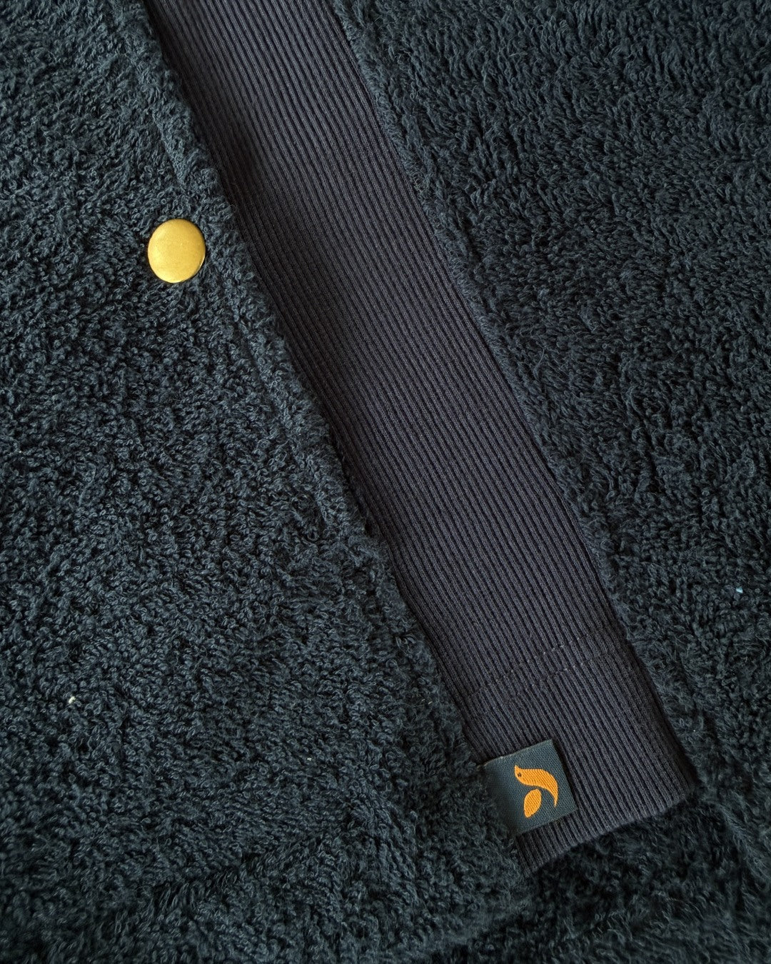 Navy Hampstead hoodie by So English featuring a comfortable fit and casual style, shown with detailed close-up of fabric and stitching.