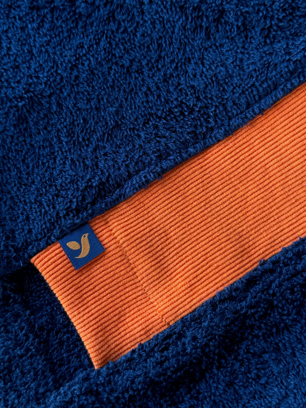 Navy and orange Bear shorts by So English featuring a playful bear design, made in the UK, casual beachwear or summer shorts.