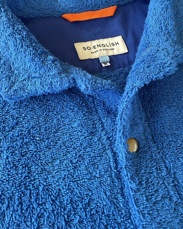 So English Bond polo shirt in Brighton Blue, featuring a classic fit and detailed collar, made in the UK.