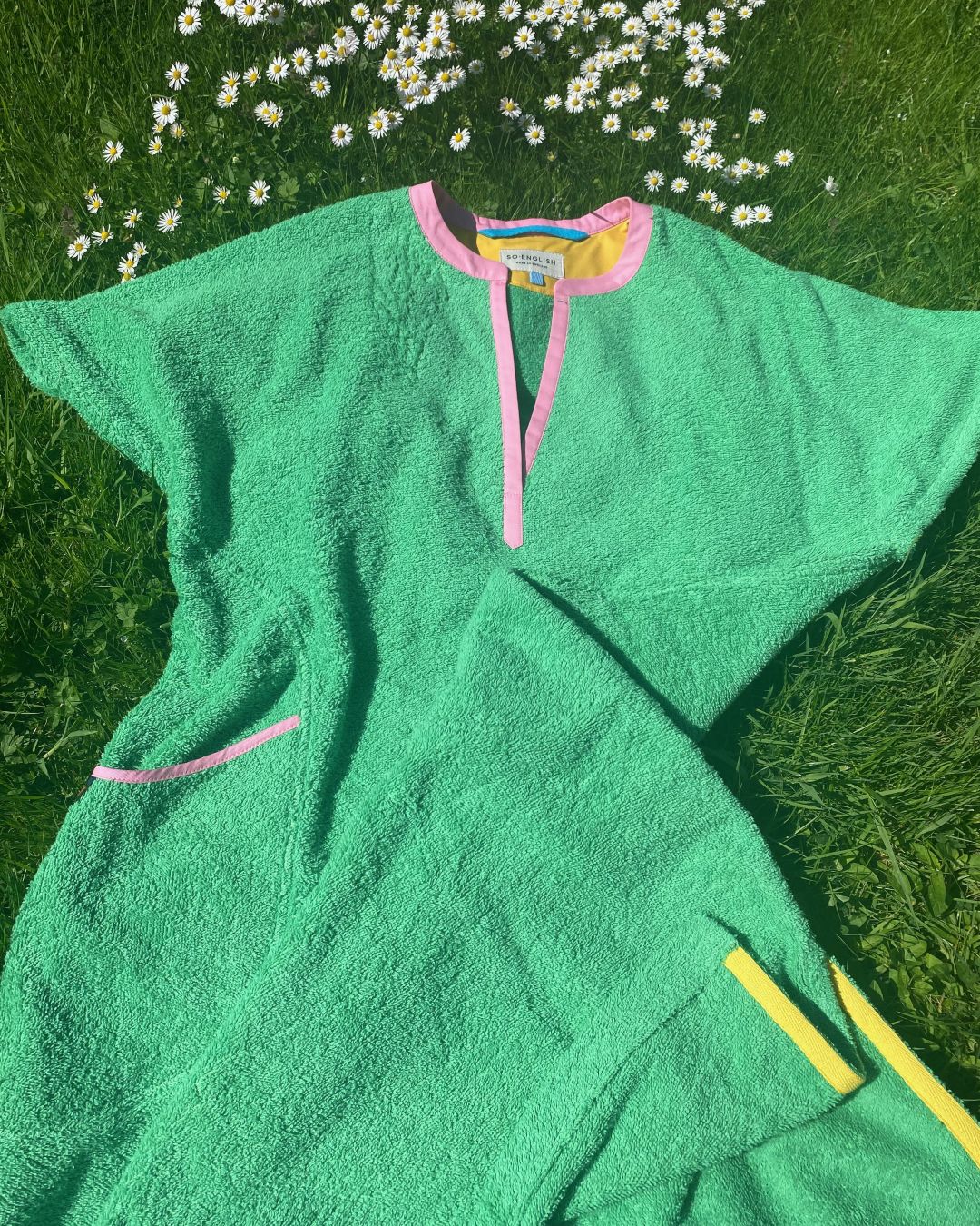 Long fresh green Kiss dress by So English, featuring a stylish beachwear design and elegant fabric, made in the UK.