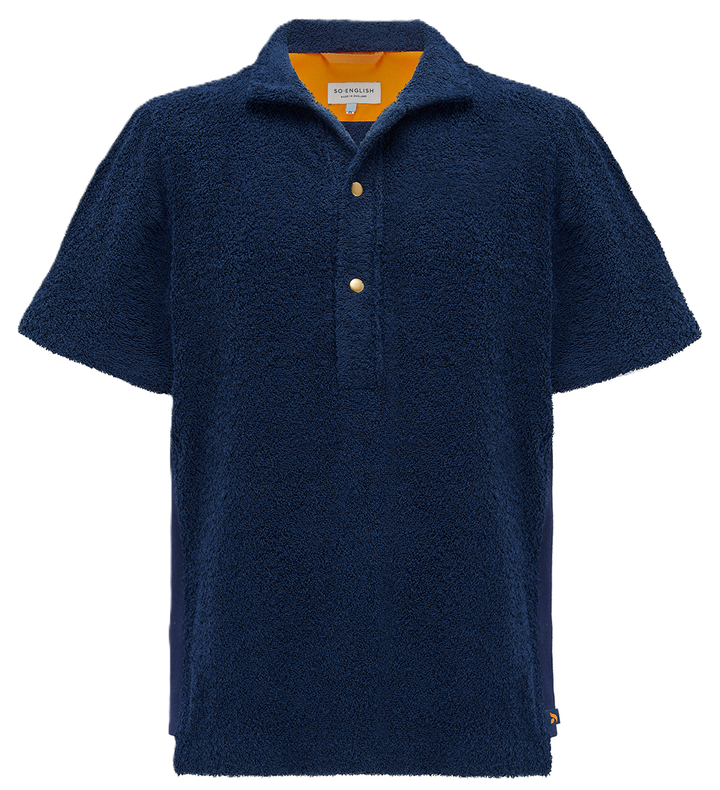 Navy Bond polo shirt by So English displayed on a hanger, showcasing a classic fit and soft cotton fabric.