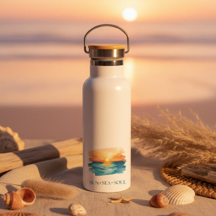 White water bottle with a sunset design and &