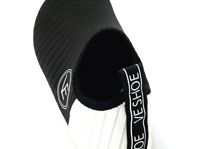 Back view of a pair of black and white VE Shoe water shoes