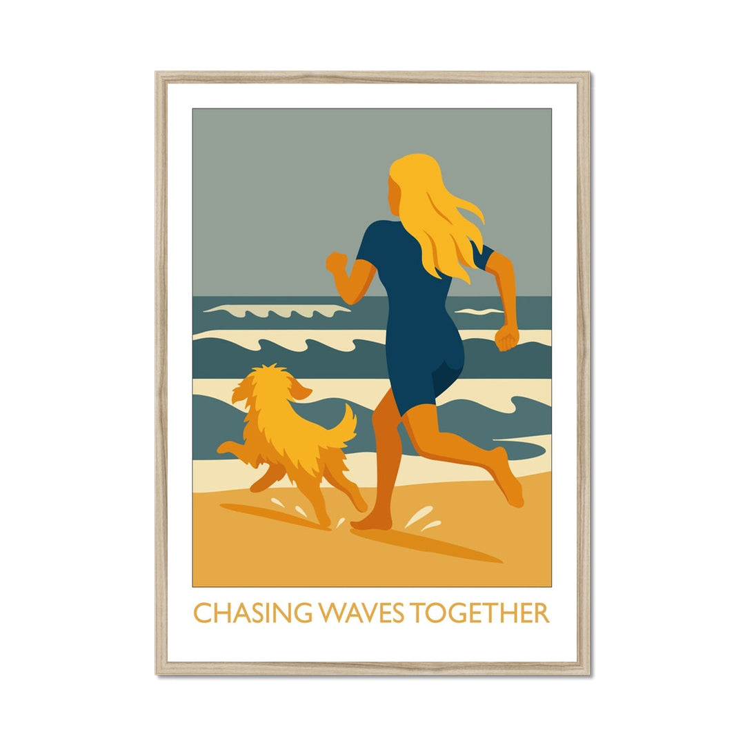 Framed wild swimming art print in natural frame featuring a swimmer and dog running along the beach, Chasing Waves Together