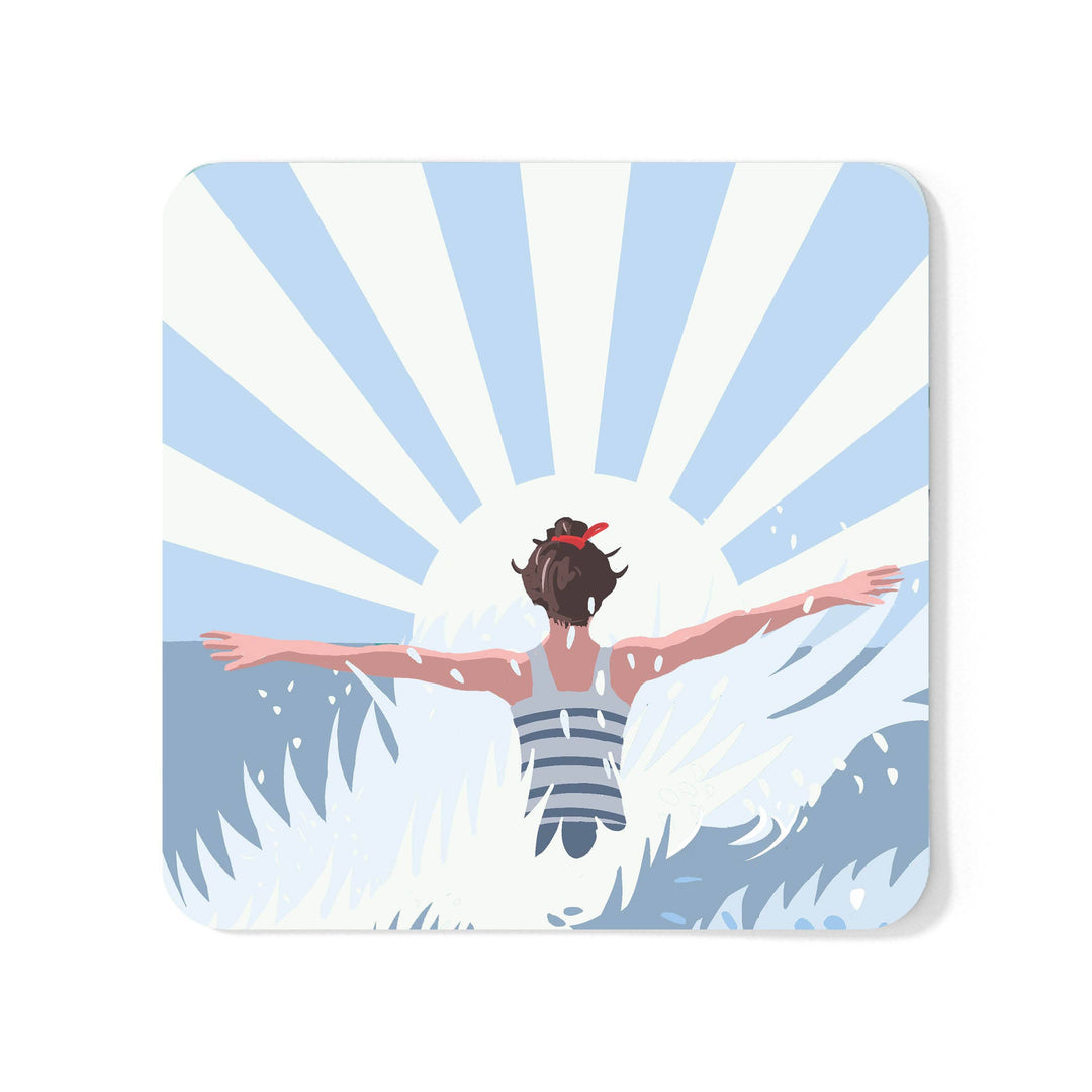 A square coaster with rounded corners featuring a retro illustration of a female swimmer in a stripey swim in the sea, set against a sunburst background.