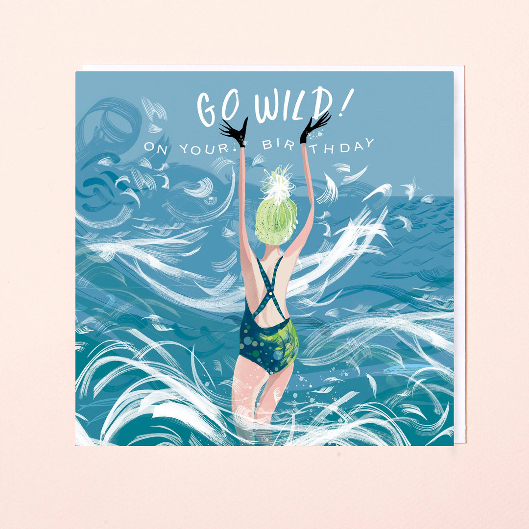 Colourful Lydia. London birthday card featuring a swimmer standing in a swirling blue sea with the words 'Go Wild On Your Birthday'.