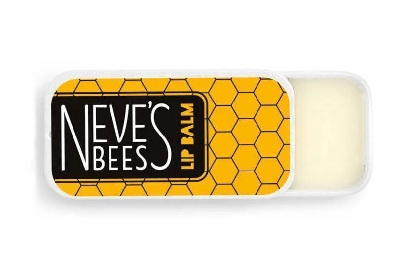 Lip balm with 'Nevie's Bees' branding on a white background - this lip balm for men offers a  powerful moisturising treatment to protect and revitalise lips.