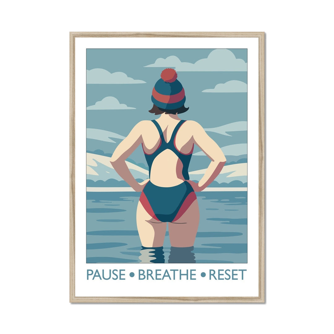 Framed wild swimming art print in a natural frame showing swimmer standing in open water titled Pause Breathe Reset