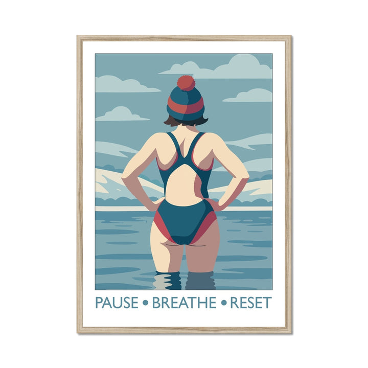 Framed wild swimming art print in a natural frame showing swimmer standing in open water titled Pause Breathe Reset