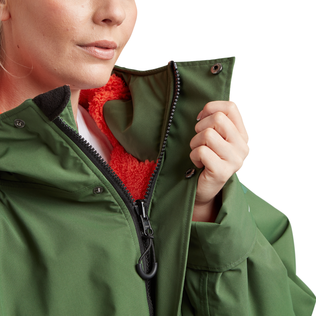 Two-way YKK zip with with easy-hold pulls and guard on Red Alter Evo long sleeve waterproof changing robe in Forest Green.