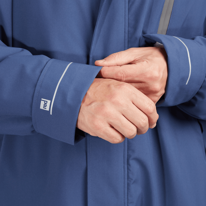 Adjustable cuff detail on Red Alter Evo men’s long sleeve waterproof changing robe in Admiral Blue.