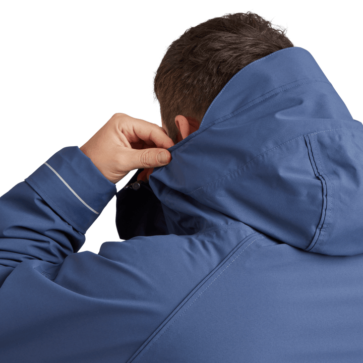 Back view of peaked hood on Red Alter Evo men’s long sleeve waterproof changing robe in Admiral Blue.