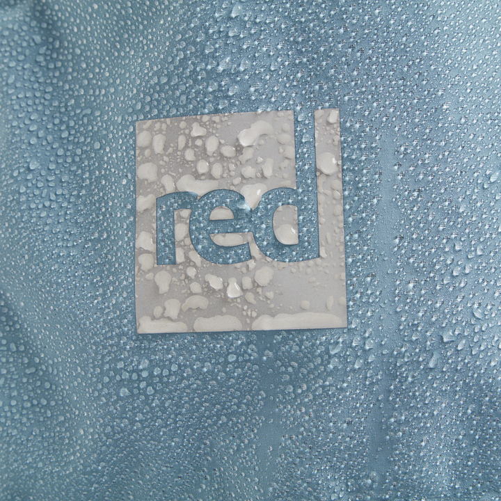 Red Equipment logo detail on Alter Evo men’s long sleeve waterproof changing robe in Alpine Blue.