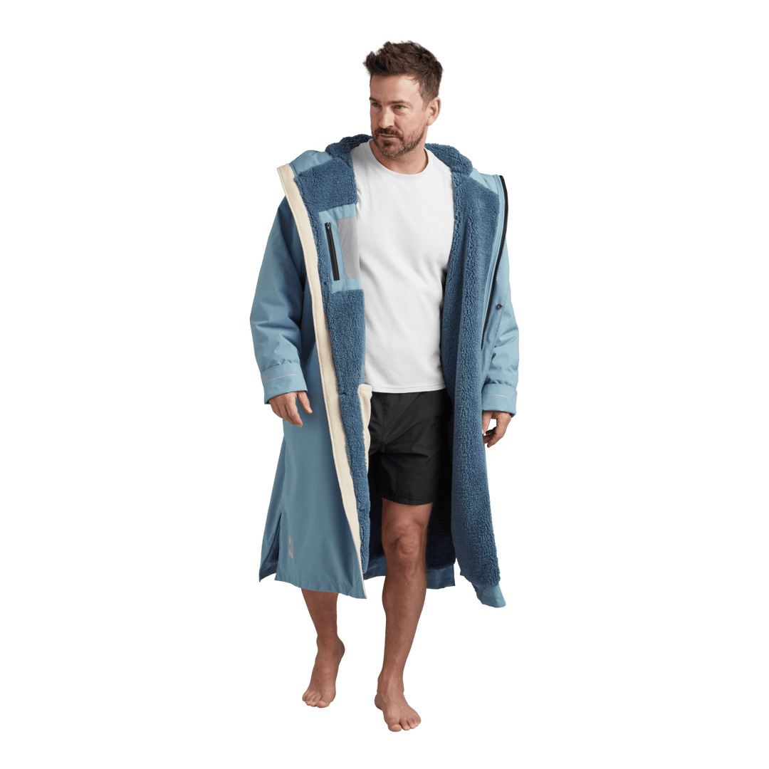 Interior view of Red Alter Evo men’s long sleeve waterproof changing robe in Alpine Blue showing blue Sherpa fleece lining.