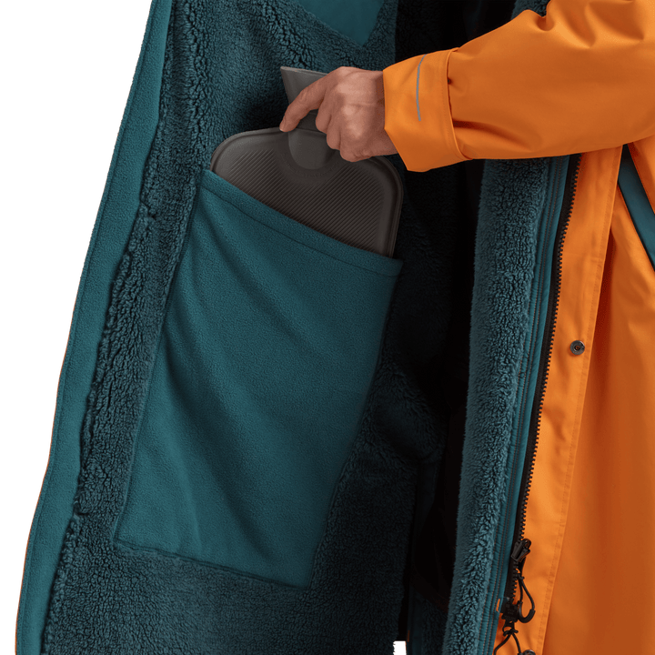 Large inside stash pocket, big enough to hold a water bottle, on Red Alter Evo men’s long sleeve waterproof changing robe in Bitter Orange.