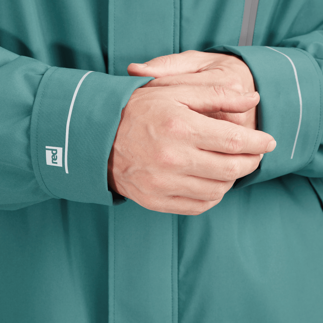 Adjustable cuff detail on Red Alter Evo men’s long sleeve waterproof changing robe in Deep Teal.