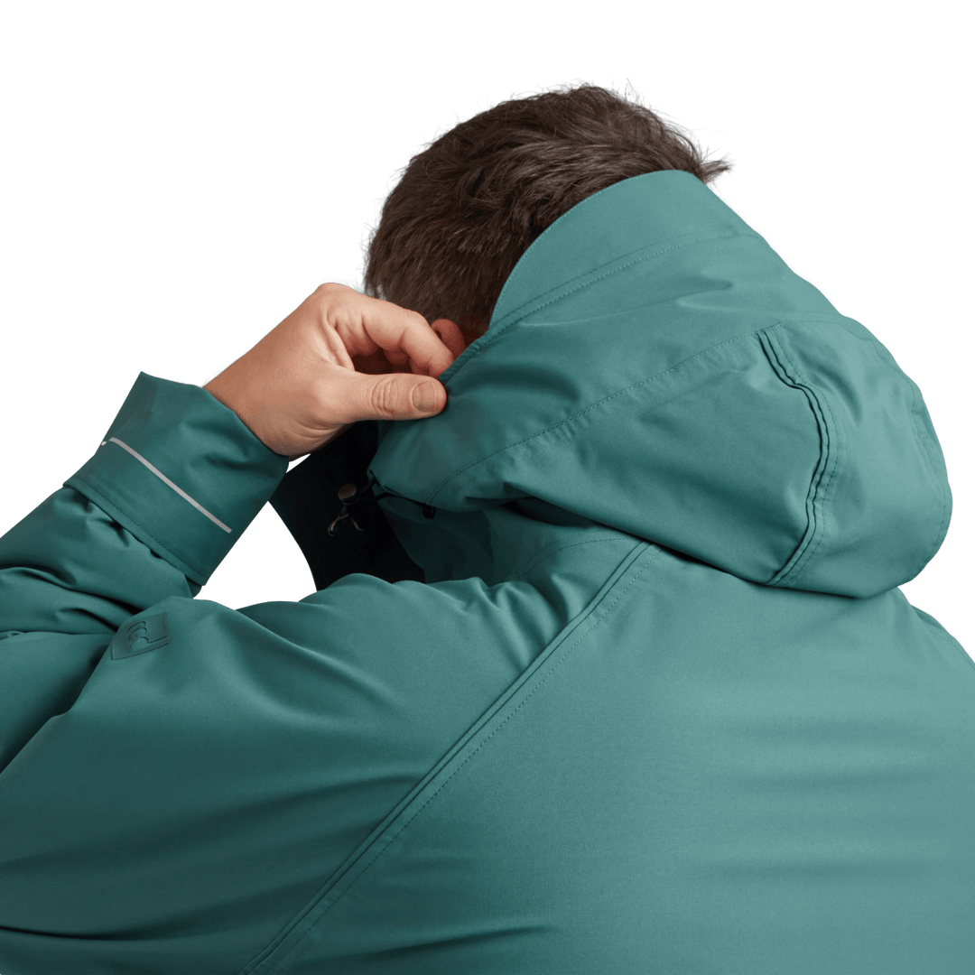 Back view of peaked hood on Red Alter Evo men’s long sleeve waterproof changing robe in Deep Teal.