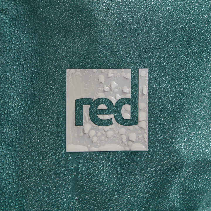 Red Equipment logo detail on Alter Evo men’s long sleeve waterproof changing robe in Deep Teal.