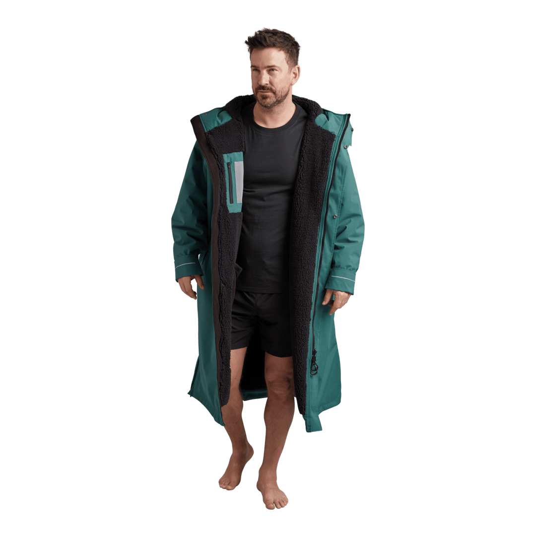 Interior view of Red Alter Evo men’s long sleeve waterproof changing robe in Deep Teal showing the black Sherpa fleece lining.
