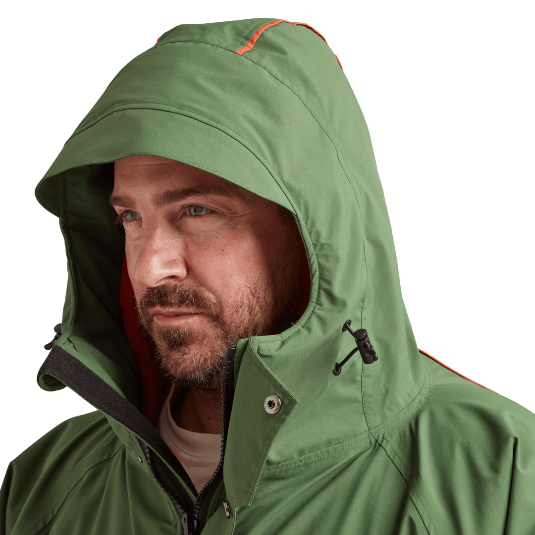 Peaked hood on Red Alter Evo men’s long sleeve waterproof changing robe in Forest Green.