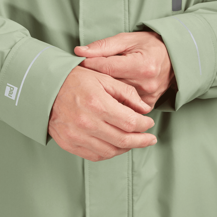 Adjustable cuff detail on Red Alter Evo men’s long sleeve waterproof changing robe in Sage Green.