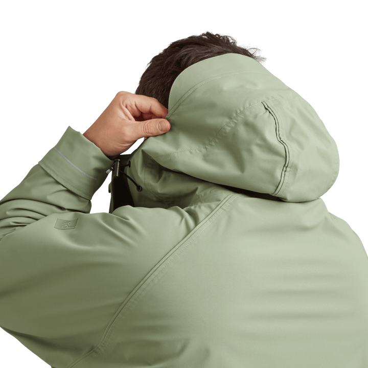 Back view of peaked hood on Red Alter Evo men’s long sleeve waterproof changing robe in Sage Green.