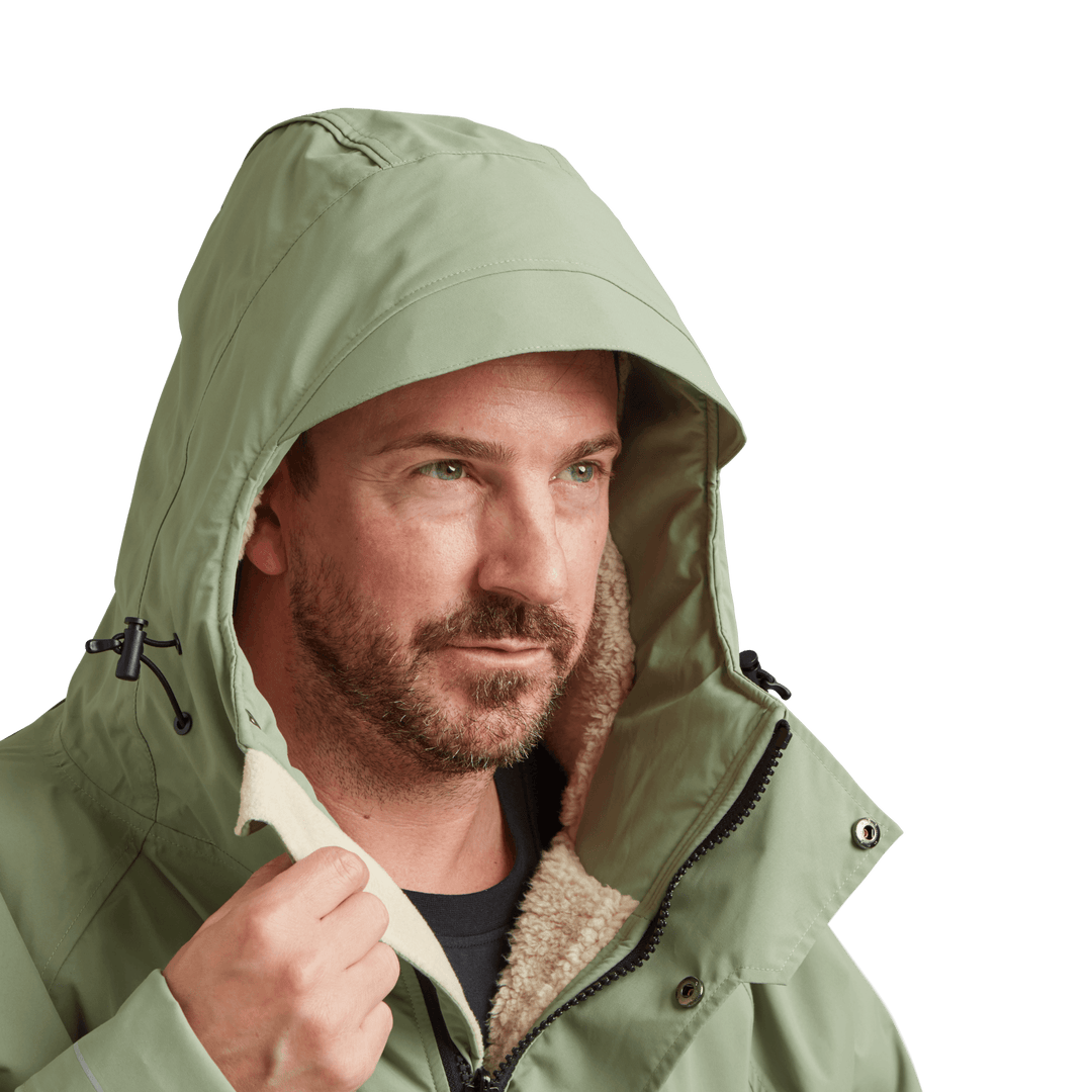 Peaked hood on Red Alter Evo men’s long sleeve waterproof changing robe in Sage Green.