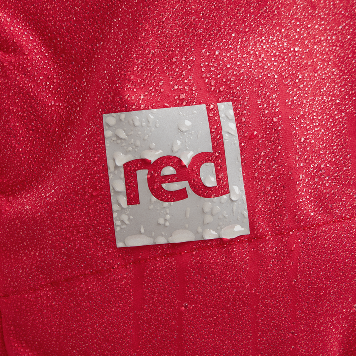 Red Equipment logo detail on Alter Evo men’s long sleeve waterproof changing robe in Siren Red.
