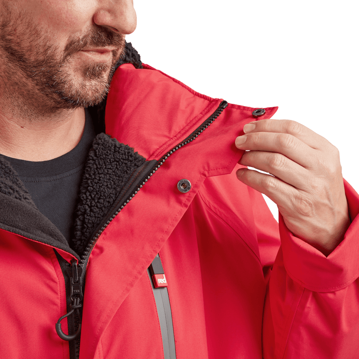 Two-way YKK zip with with easy-hold pulls and guard on Red Alter Evo men’s long sleeve waterproof changing robe in Siren Red.