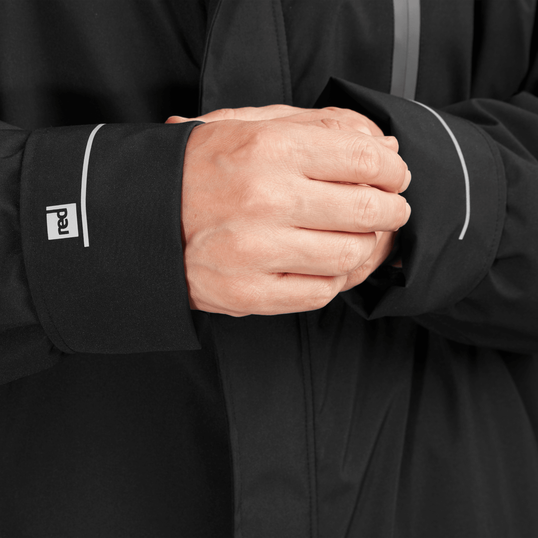 Adjustable cuff detail on Red Alter Evo men’s long sleeve waterproof changing robe in Stealth Black.