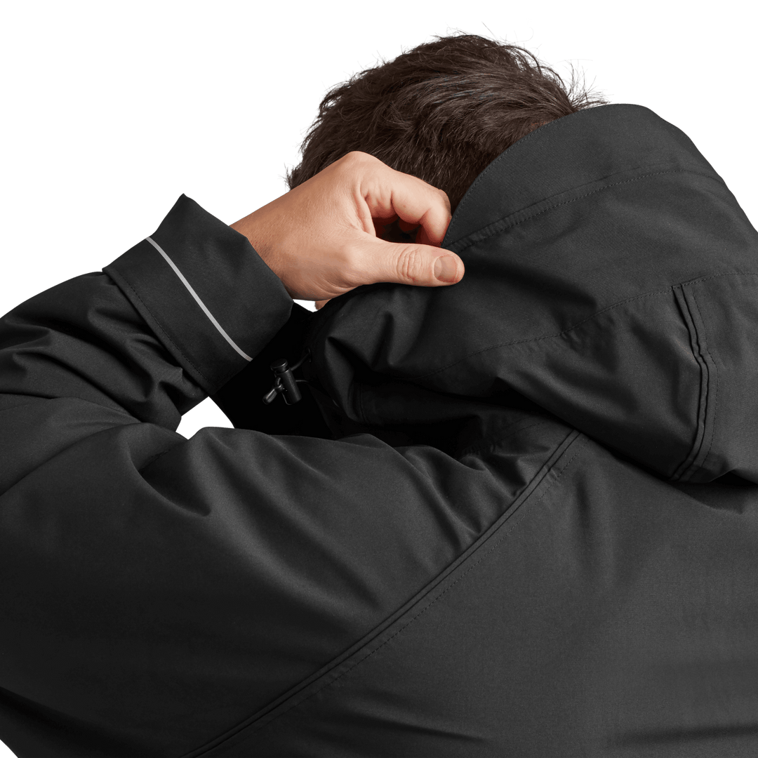 Back view of peaked hood on Red Alter Evo men’s long sleeve waterproof changing robe in Stealth Black.