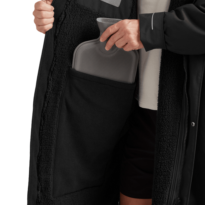 Large inside stash pocket, big enough to hold a hot water bottle, on Red Alter Evo men’s long sleeve waterproof changing robe in Stealth Black.