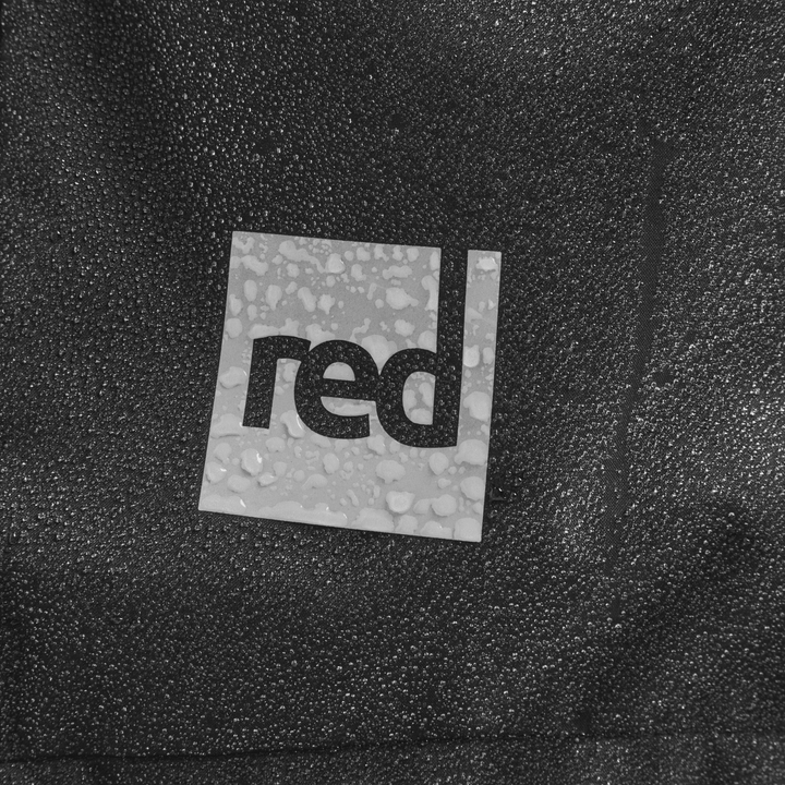 Red Equipment logo detail on Alter Evo men’s long sleeve waterproof changing robe in Stealth Black.