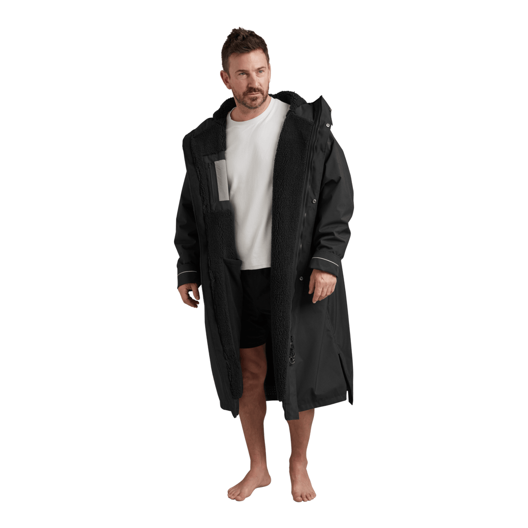 Interior view of Red Alter Evo men’s long sleeve waterproof changing robe in Stealth Black showing the black Sherpa fleece lining.