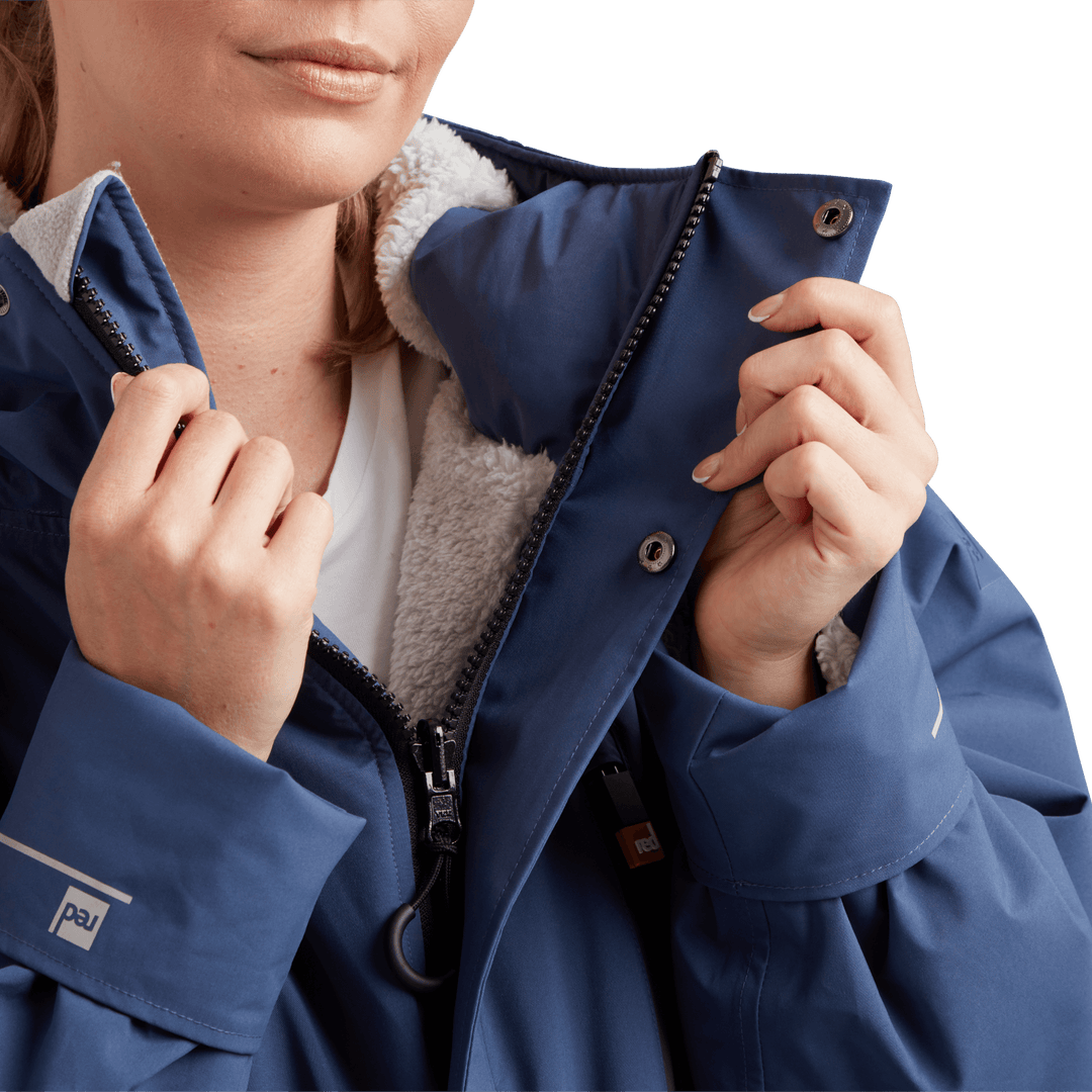 Two-way YKK zip with with easy-hold pulls and guard on Red Alter Evo women’s long sleeve waterproof changing robe in Admiral Blue.