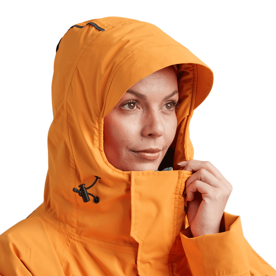 Peaked hood on Red Alter Evo women’s long sleeve waterproof changing robe in Bitter Orange.