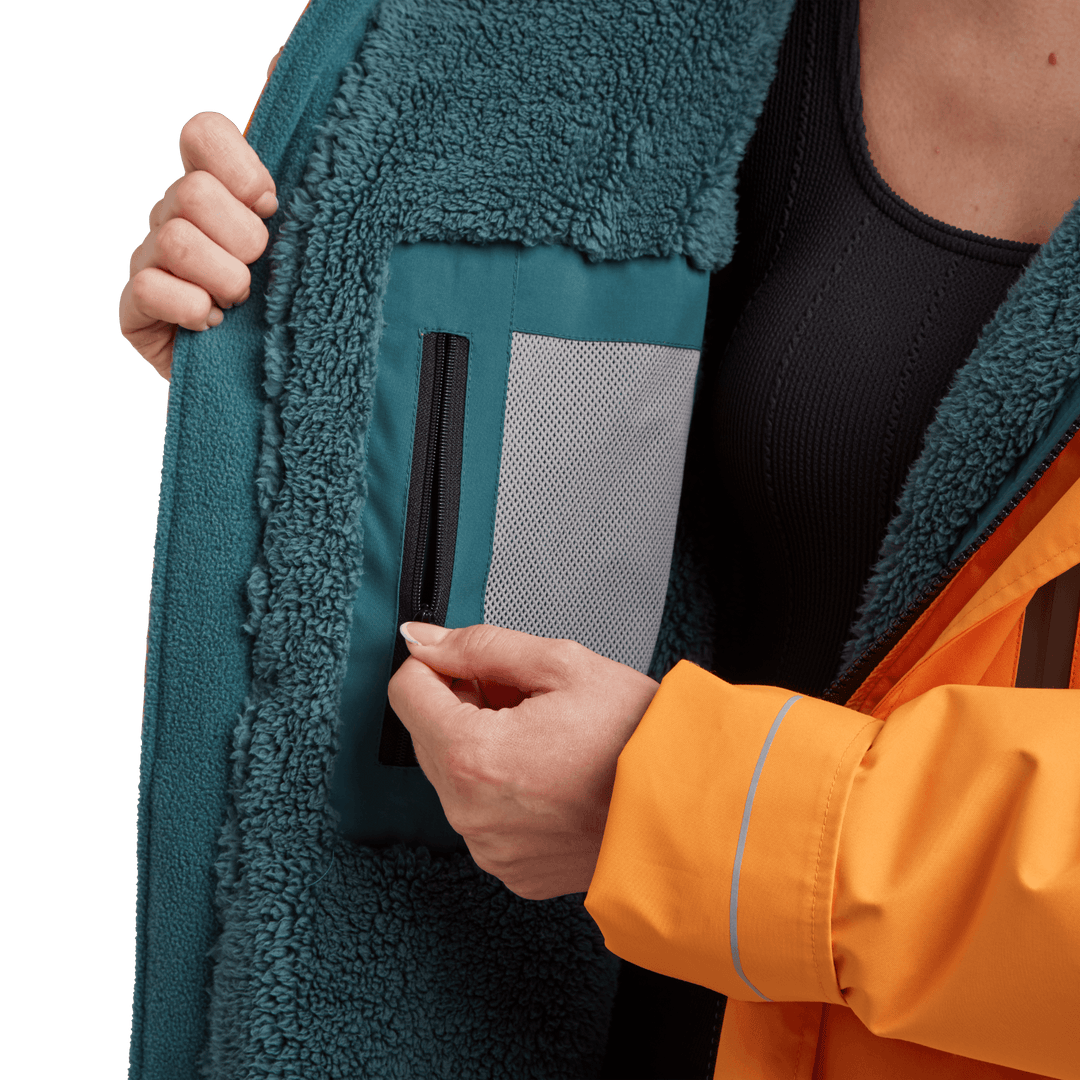 Red Alter Evo women’s long sleeve waterproof changing robe in Bitter Orange with inside zipped pocket.