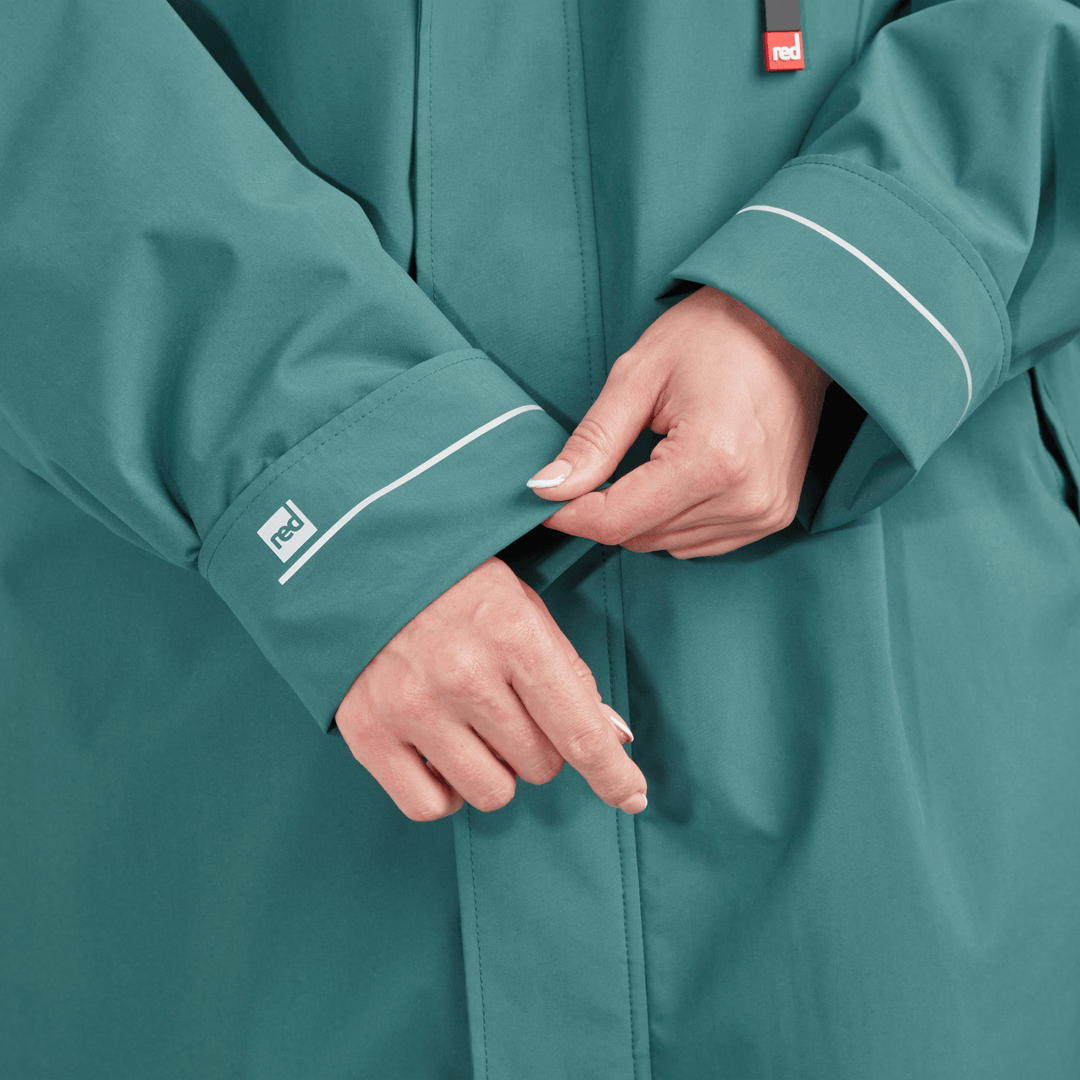 Adjustable cuff detail on Red Alter Evo women’s long sleeve waterproof changing robe in Deep Teal.