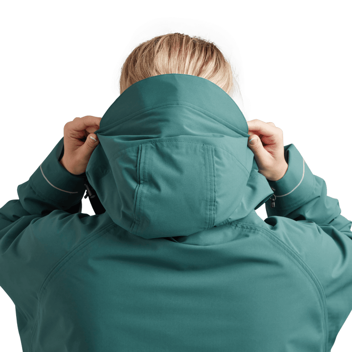 Back view of peaked hood on Red Alter Evo women’s long sleeve waterproof changing robe in Deep Teal.
