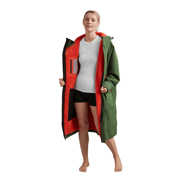 Interior view of Red Alter Evo women’s long sleeve waterproof changing robe in Forest Green showing the burnt orange Sherpa fleece lining.