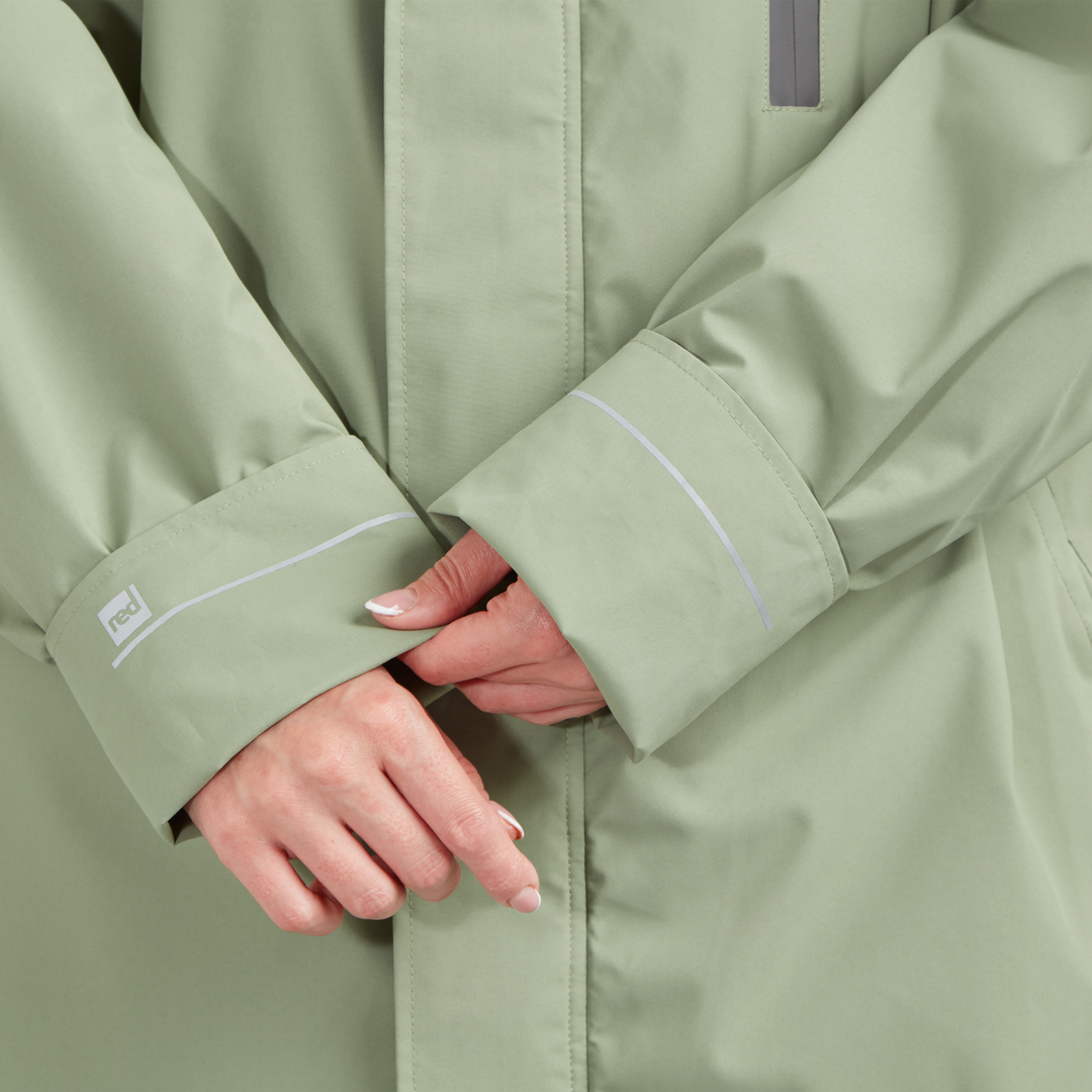Adjustable cuff detail on Red Alter Evo women’s long sleeve waterproof changing robe in Sage Green.