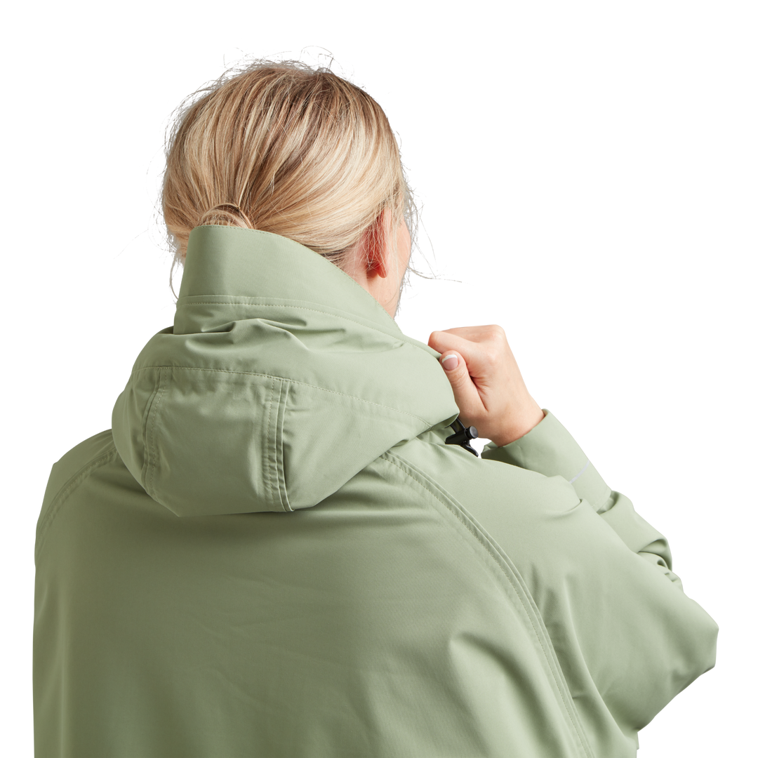 Back view of peaked hood on Red Alter Evo women’s long sleeve waterproof changing robe in Sage Green.