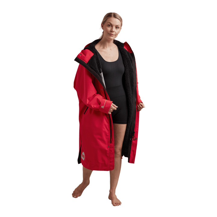 Interior view of Red Alter Evo women’s long sleeve waterproof changing robe in Siren Red showing the black Sherpa fleece lining.