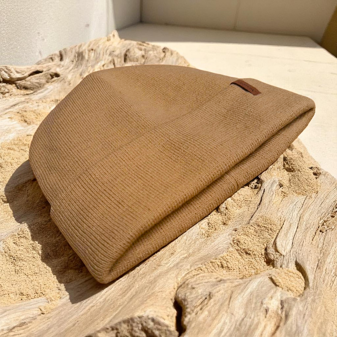 Swimbler Fawn Waterproof Beanie with soft fleece lining and waterproof design, perfect for swimmers and outdoor adventurers.