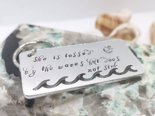 'TOSSED BY THE WAVES' Keyring
